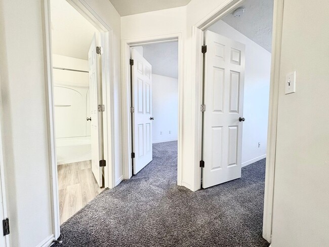 Building Photo - Spacious 3 Bed Townhome in West Valley City with Gated Yard, Garage & Pool