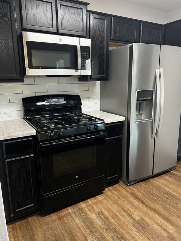 Building Photo - 7002 Cozy Run