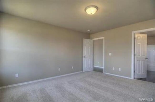 Building Photo - Stylish 4BR/2BA Home with Garage & Privacy Fence