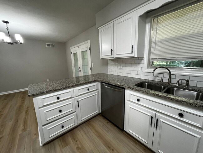 Building Photo - Must See the Sunroom off the Primary Bedroom!
