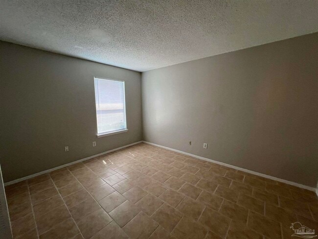 Building Photo - 6809 Tiki Ln