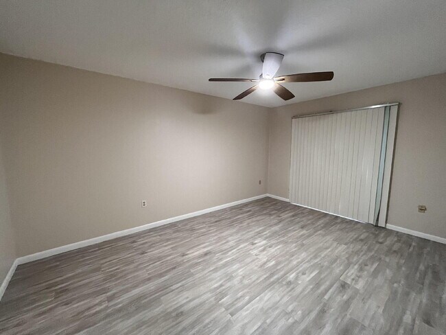 Building Photo - Two-story condominium, featuring 2 bedrooms and 2 1/2 bathrooms