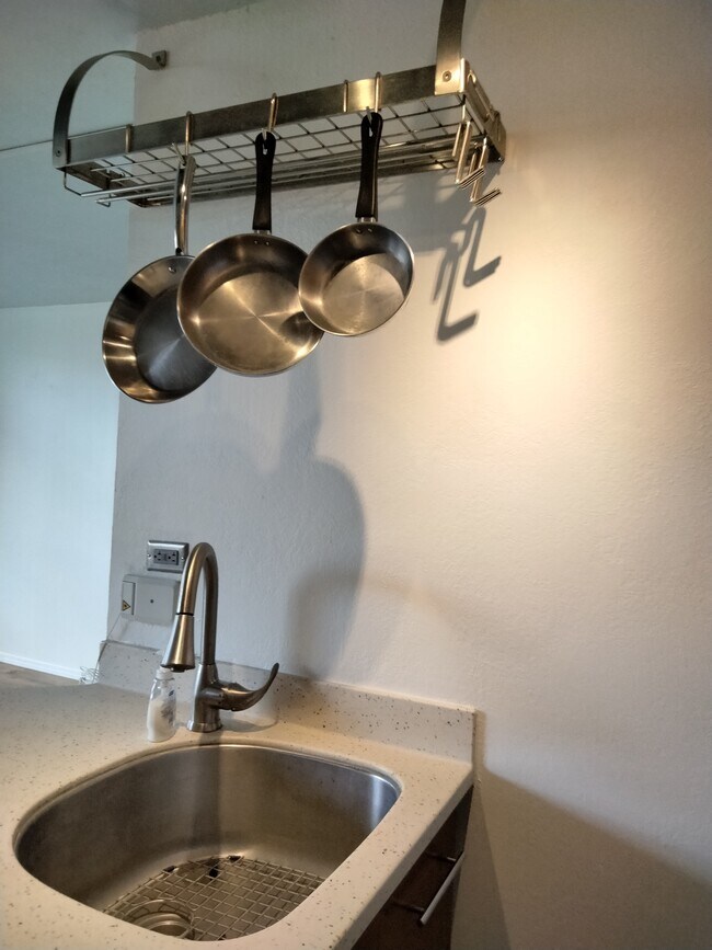 Chef style Hanging Pots & Pans; Stainless steel sink - 1571 Piikoi St