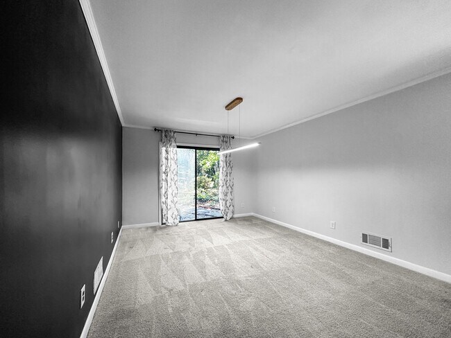 Building Photo - Charming 4BR 2BA w/ Covered Carport • In-Unit Laundry • Front Deck in Chamblee