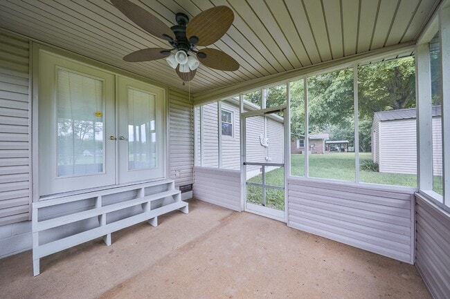 Building Photo - Dresden Home with Carport and Screened-in ...