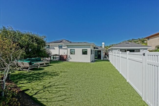 Building Photo - Beautifully Remodeled, Bright & Modern 4BR3BA Home w/ 2BR1BA Guest House On Sprawling Corner Lot ...