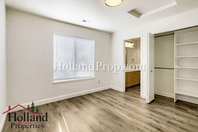 Building Photo - Charming 3-Bedroom Home with Wood Floors, Gas Fireplace & Private Patio