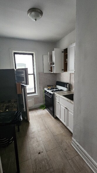 Building Photo - 6717-6718 8th Ave