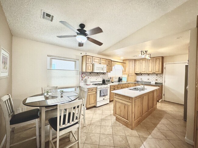 Building Photo - Fully Furnished Henderson Rental Near Cadence | 2 Bed Home w/ Solar + Backyard | Close to Cowabun...
