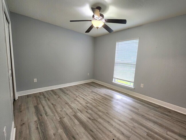 Building Photo - Welcome to your 4/2 dream home in Pace Mil...