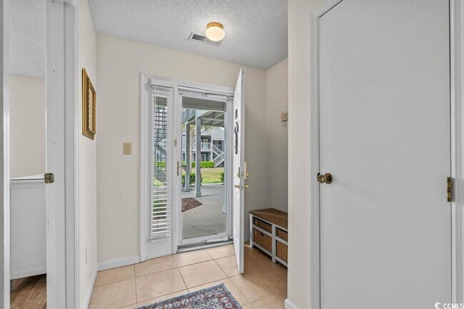 Building Photo - Ground floor, 2 bedroom, 2 bath, end unit- 10 mins to Surfside Beach.