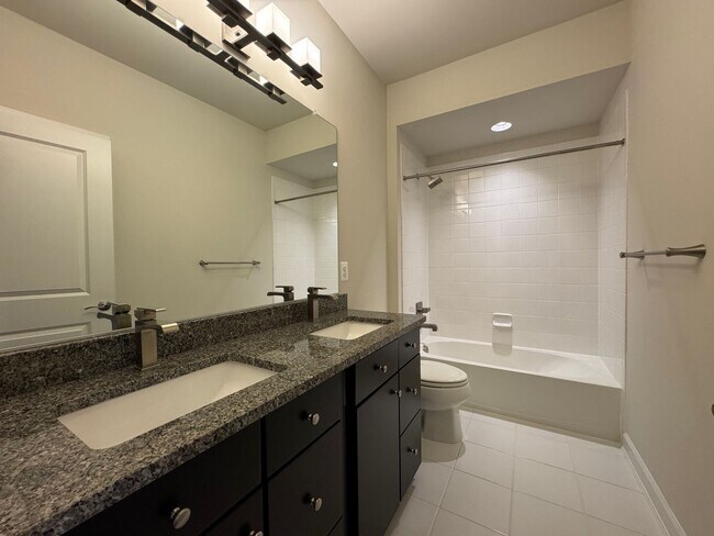 Building Photo - Stunning 4 Level 4 Bed 3/2 Bath Home With Balcony And Deck In Westmoore At Moorefield