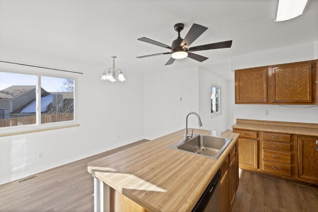 Building Photo - Spacious 6-Bedroom / 3.5-Bath Home — Great Location + Solar Savings!