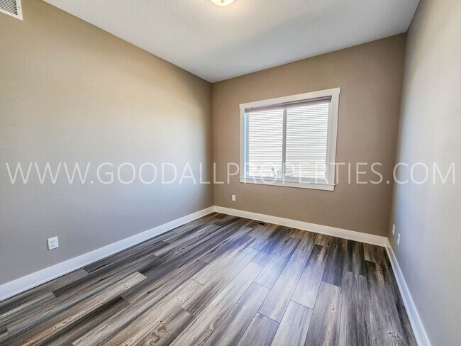 Building Photo - Spacious Waukee Ranch | 4 Bedrooms | 3-Car Garage | Finished Basement
