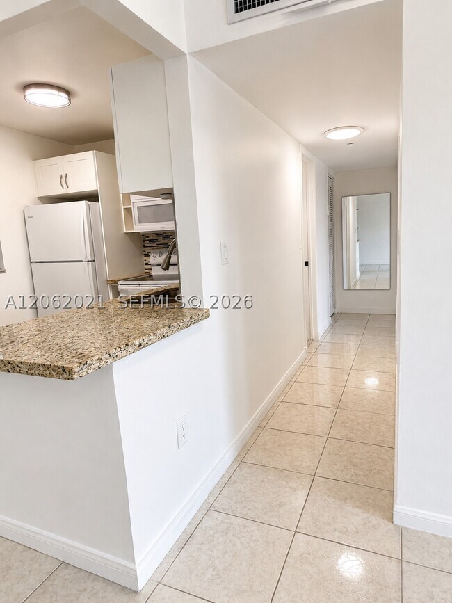 Building Photo - 6095 W 18th Ave