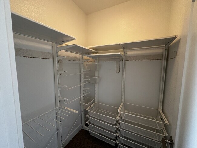 Building Photo - "Experience Modern Comfort: Spacious 2-Bed...