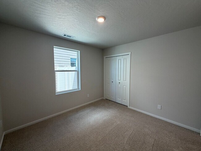 Building Photo - Beautiful & Brand New- 4 bed, 2 bath w/Quartz Countertops & Fenced Yard