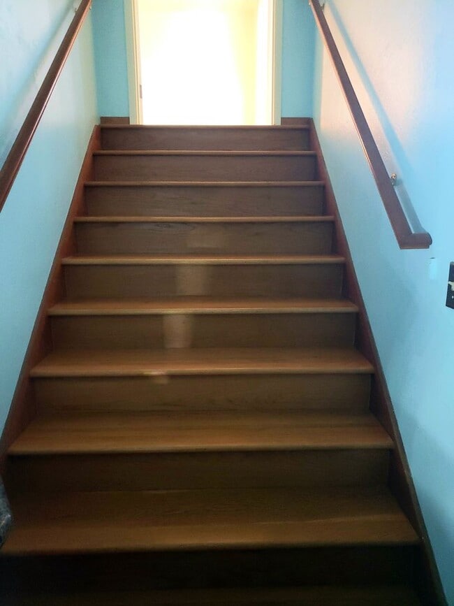 Building Photo - Bright Upstairs Studio with Deck & Peek of the Ocean | Utilities Included