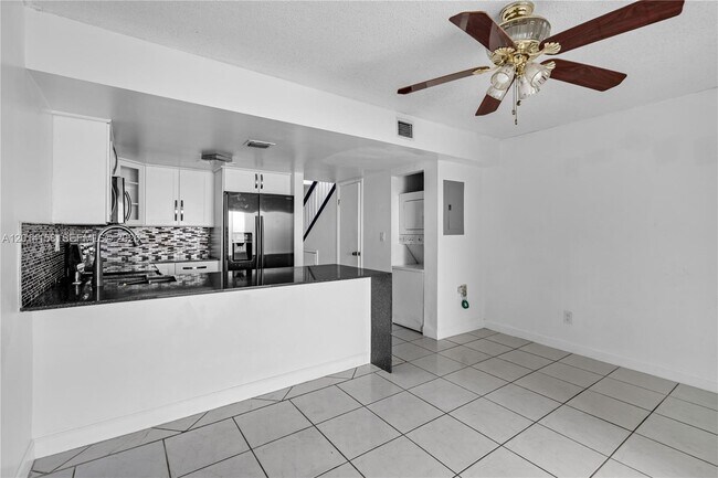 Building Photo - 5375 W 23rd Ct