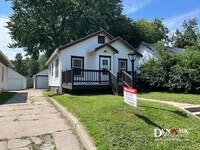 Building Photo - Updated 4+ Bedroom, 2 Bathroom House with Garage and Fenced Backyard