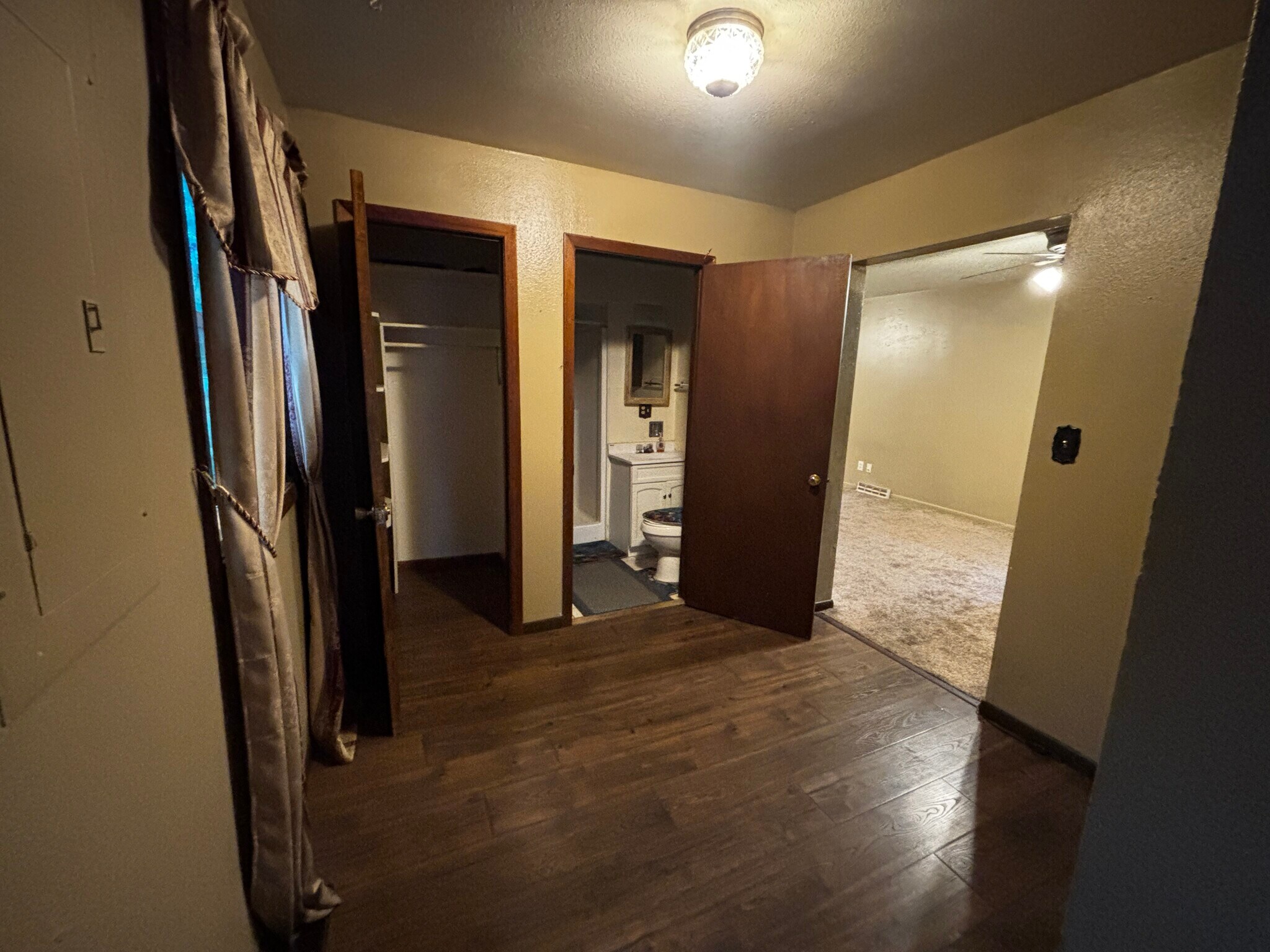 Nook looking at living room, main floor 1.75 bath, and pantry. - 829 W 5th Ave