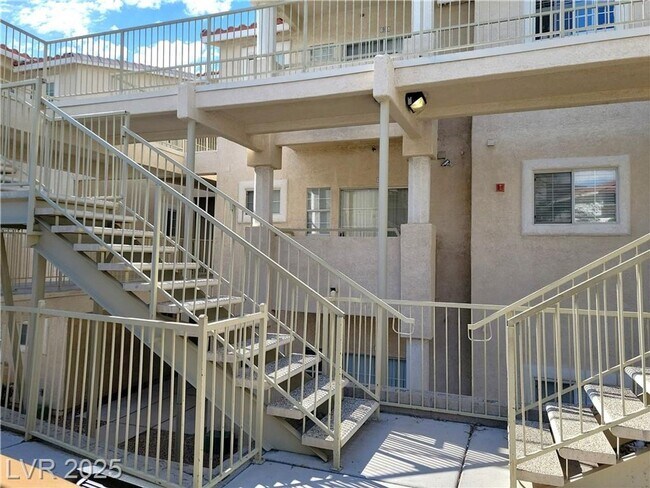Building Photo - Inviting Green Valley Condo with Dual Balc...