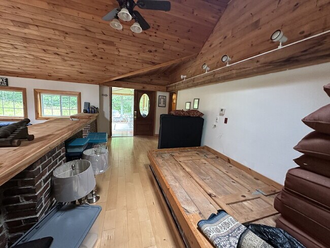 Building Photo - Charming 3BR Waterfront Retreat with Sunroom, Brick Accent & Scenic Lake Views