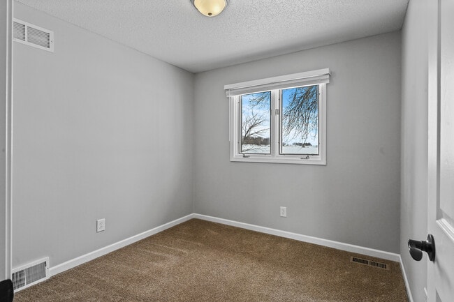 Building Photo - 9402 65th St NE