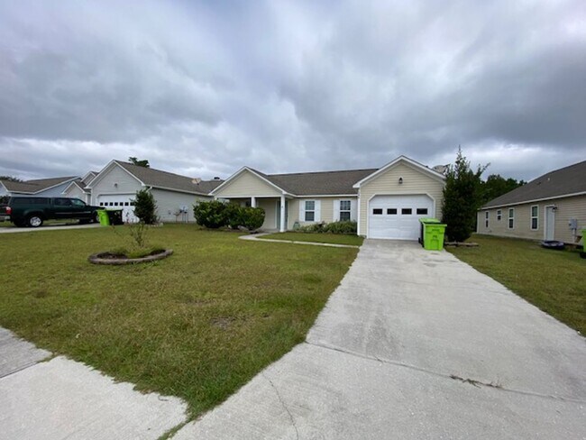 Building Photo - 206 Red Carnation Dr