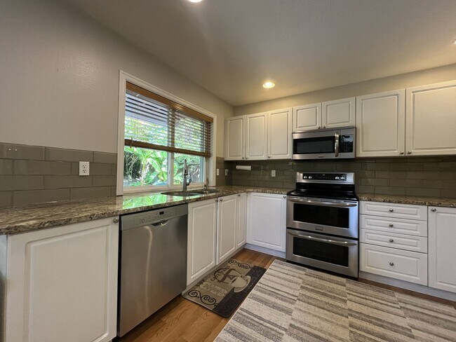 Building Photo - Spacious 3-Bedroom Home with Two Living Areas, Private Balcony, Fireplace & Attached 2-Car Garage