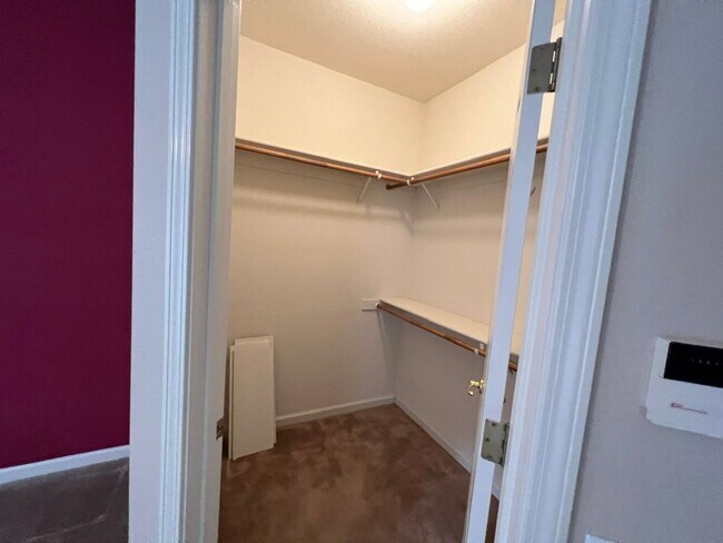 Building Photo - 4 bedrooms with 3 car garage in Rose Lane ...