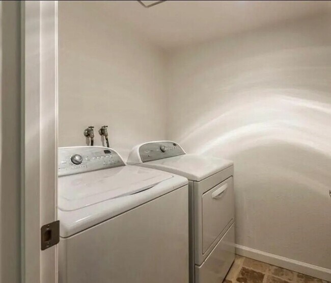 Building Photo - Beautiful 2-Bedroom Condo with Serene Wate...