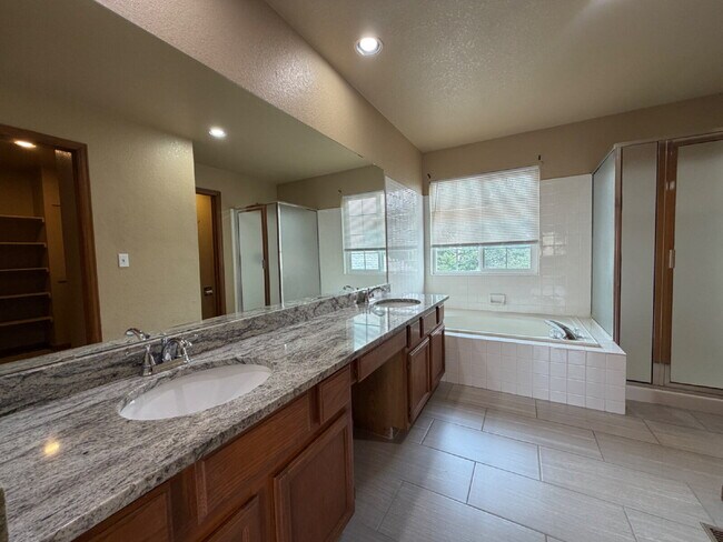 Building Photo - ~Available Now~  Beautiful Four Bedroom Home with Fireplace, Private Yard & Luxurious Primary Suite!