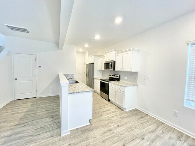 Building Photo - 3 br 2.5 ba Paired Home with attached gara...