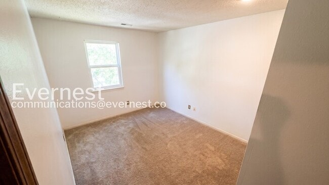 Building Photo - 3 Bed/2.5 Bath Townhome with Fenced Yard / Pets Not Accepted / Vouchers Accepted / Coming Soon!