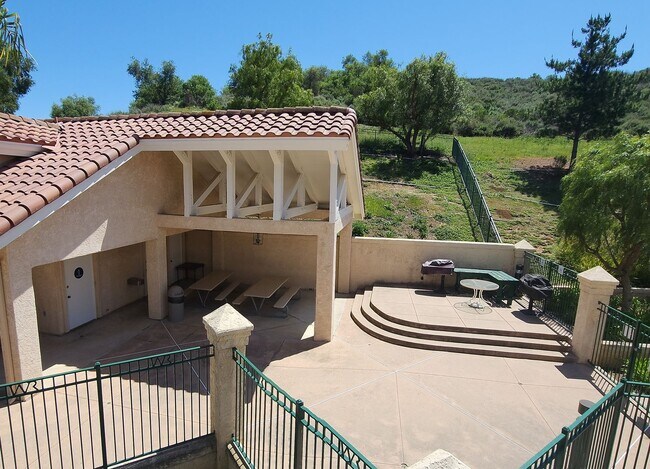 Building Photo - Gorgeous 2 bedroom newly renovated upstairs corner condo in gated community with pool & hill side...