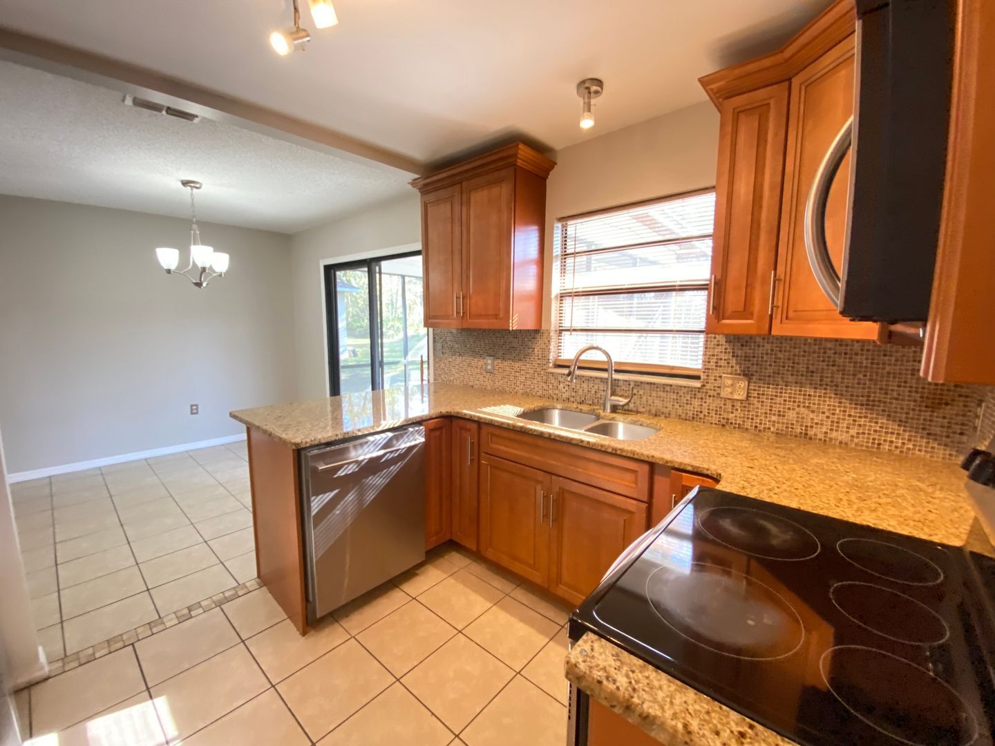 Building Photo - 2/2 home with garage - tile on inside with...