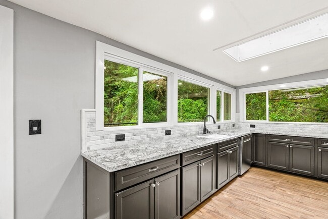 Building Photo - 1st Month FREE!! Riverfront Haven with Pri...