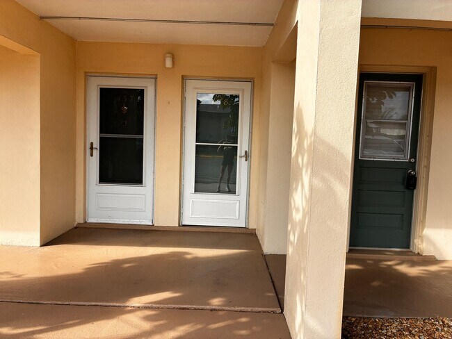 Building Photo - 55+ Charming first-floor condo nestled in the serene Fairways 3 Condominiums