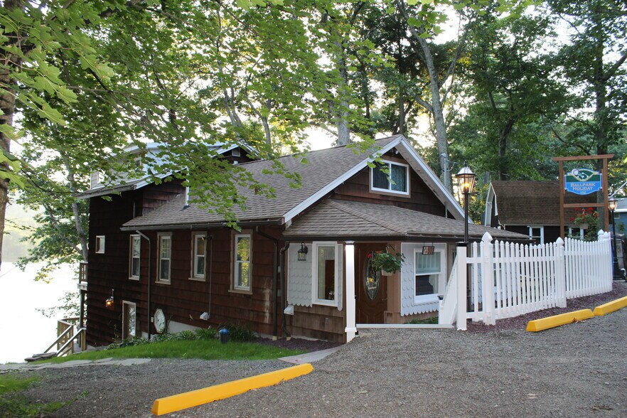 Exterior view - Unit #1 is the lower level - 102 Holiday Ln