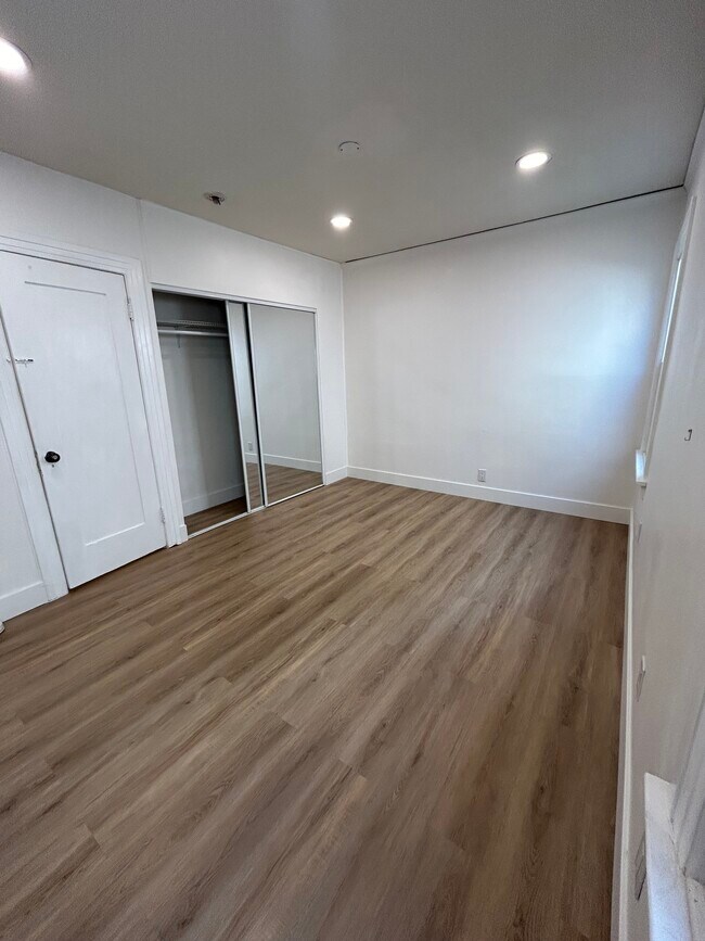 Bedroom #1 with closet - 1139 S Highland Ave