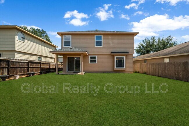 Building Photo - 10411 Artesia Wells