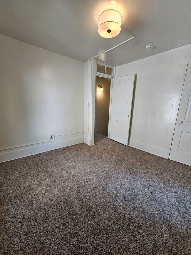 Building Photo - There is a $25 fee per application and everyone over 18 needs to fill out their own application.