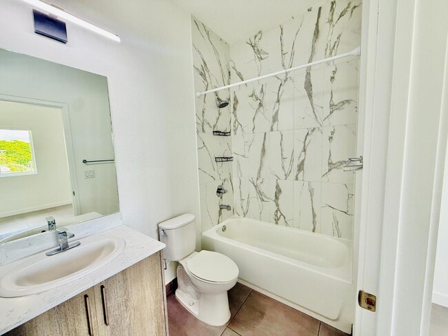 Building Photo - 1295 W 69th St