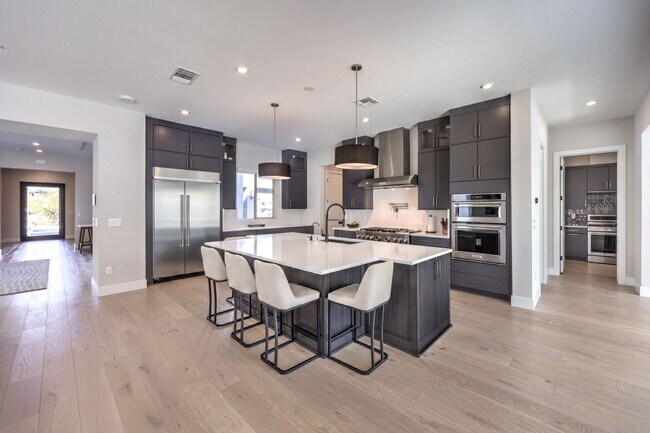 Building Photo - Exquisite 6-bed/ 6-bath residence nestled within the prestigious, guard-gated community of Revere...