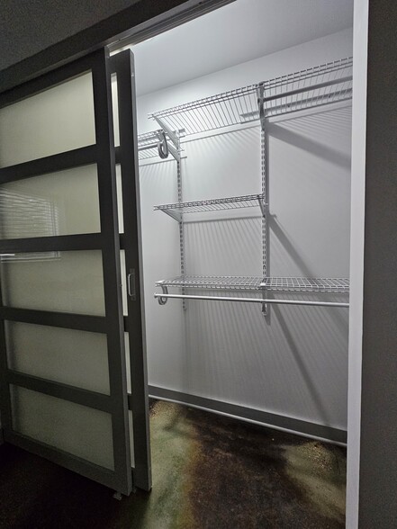 Storage system in both bedroom closets - 3134 Hermina St