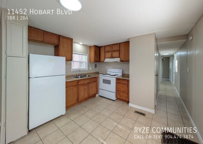 Building Photo - 11452 Hobart Blvd