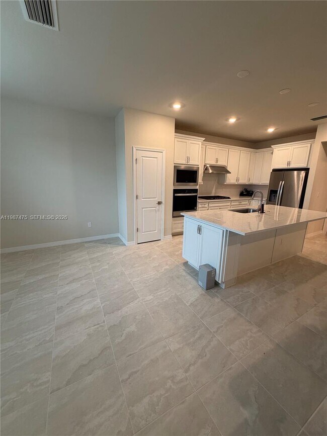 Building Photo - 12251 SW Periwinkle Ct