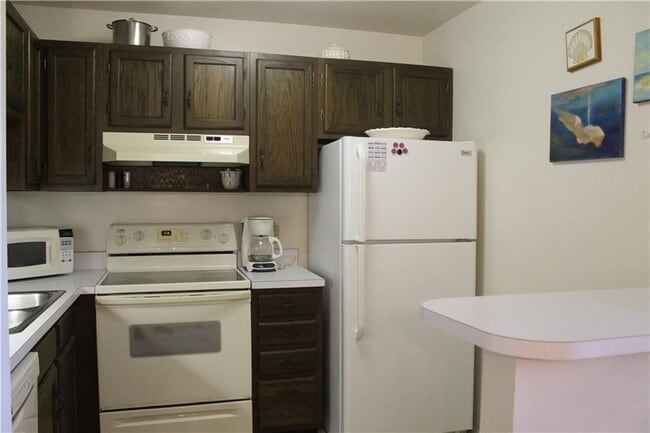Building Photo - ANNUAL RENTAL 1/1 COMING SOON 55+