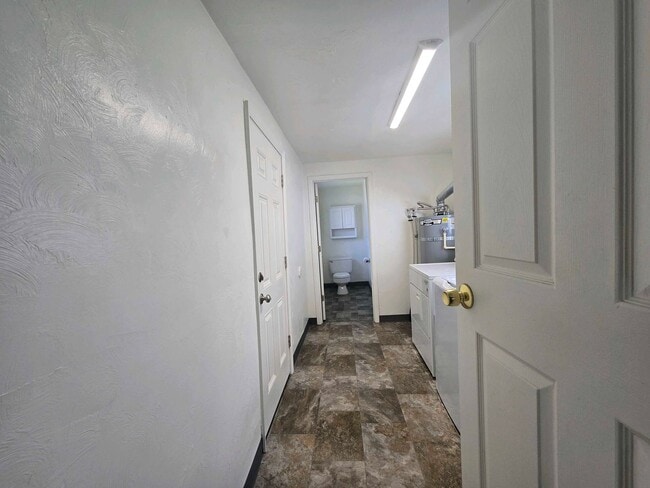 Building Photo - Cozy 2 Bed, 2 Bath Home with Parking Spaces and a Fenced Backyard!